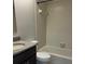 Bathroom featuring granite countertops, tiled walls, and a shower and tub combo at 2332 S Fairway Dr, Plant City, FL 33566