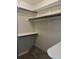 Bright closet with built-in shelves and rods, offering ample storage space at 2332 S Fairway Dr, Plant City, FL 33566