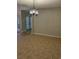 Spacious dining room with tile floors and modern lighting, ready for entertaining and Gathering meals at 2332 S Fairway Dr, Plant City, FL 33566