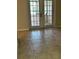 Tile flooring in the room with French doors providing access to the patio area at 2332 S Fairway Dr, Plant City, FL 33566
