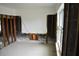 A bedroom with exposed wall studs and a window, ready for renovation and personalization at 2470 Del Rio Way, Dunedin, FL 34698