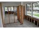 Open-concept living room with access to the pool area at 2470 Del Rio Way, Dunedin, FL 34698
