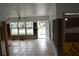 Entry to the living room showing flooring and exposed walls at 2470 Del Rio Way, Dunedin, FL 34698