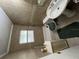 A bathroom complete with shower, toilet, sink, and neutral tile at 2524 Novus St, Sarasota, FL 34237