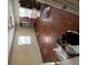 Bedroom with hardwood floors, windows for natural light, and original trim at 2524 Novus St, Sarasota, FL 34237