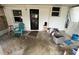 Enclosed patio featuring a tile floor, seating, and lots of natural light at 2524 Novus St, Sarasota, FL 34237