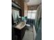 Standard bathroom with tub and vanity at 2701 W Cherry St, Tampa, FL 33607