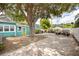 Backyard featuring paved driveway and boats on trailers at 2709 Upton S St, Gulfport, FL 33711