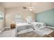 Spacious bedroom with ceiling fan and two beds at 2709 Upton S St, Gulfport, FL 33711