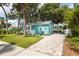 Charming bungalow featuring a well manicured lawn, brick driveway and quaint front porch at 2709 Upton S St, Gulfport, FL 33711