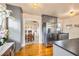 Bright kitchen boasts wood floors, gray cabinets, and stainless steel appliances at 2709 Upton S St, Gulfport, FL 33711