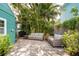 Inviting outdoor patio with tropical foliage, perfect for relaxing or entertaining at 2709 Upton S St, Gulfport, FL 33711