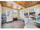 Bright and spacious work space includes wood ceiling, outdoor access and multiple windows at 2709 Upton S St, Gulfport, FL 33711