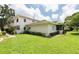 Lush backyard with well-maintained lawn and mature landscaping providing a private outdoor space at 2943 Bough Ave # C, Clearwater, FL 33760
