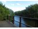 Scenic balcony view overlooking a tranquil waterway surrounded by lush greenery at 2943 Bough Ave # C, Clearwater, FL 33760