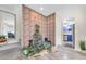Welcoming home foyer featuring a rock water feature and access to the kitchen area at 2943 Bough Ave # C, Clearwater, FL 33760