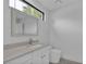 Modern bathroom with updated vanity, sink, and fixtures at 319 Midway Is, Clearwater Beach, FL 33767