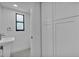 Modern bathroom with sink and storage space at 319 Midway Is, Clearwater Beach, FL 33767