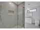 Modern bathroom with glass enclosed shower and stylish vanity at 319 Midway Is, Clearwater Beach, FL 33767