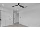 Clean, well lit bedroom with closet, ceiling fan, and modern finishes at 319 Midway Is, Clearwater Beach, FL 33767