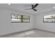 Clean, well lit bedroom with views from two windows and modern finishes at 319 Midway Is, Clearwater Beach, FL 33767
