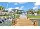 This home features a private dock and boat lift and access to the water at 319 Midway Is, Clearwater Beach, FL 33767