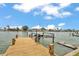 This property comes complete with a private dock and lift along the waterfront at 319 Midway Is, Clearwater Beach, FL 33767
