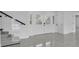 Welcoming foyer with decorative glass front door, stylish tile flooring, and staircase with glass panels at 319 Midway Is, Clearwater Beach, FL 33767