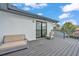 Relaxing patio with comfortable seating, scenic views, and privacy railing to enjoy the outdoors at 319 Midway Is, Clearwater Beach, FL 33767