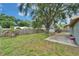 Enjoy outdoor living in this fenced backyard with mature trees and a playset at 3619 15Th Se Ave, Largo, FL 33771