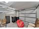 The garage offers ample storage space with its high ceilings and shelving at 3619 15Th Se Ave, Largo, FL 33771
