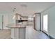 Open kitchen featuring granite countertops and stainless steel appliances at 3619 15Th Se Ave, Largo, FL 33771