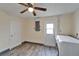 This laundry room includes a washer, dryer, and doors to additional storage at 3619 15Th Se Ave, Largo, FL 33771
