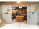 Spacious garage with double doors, workbench and tool storage; ideal for a workshop at 36725 Arcadia Ave, Myakka City, FL 34251
