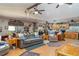 Open-concept living space with seamless flow into the kitchen and dining area, ideal for entertaining at 36725 Arcadia Ave, Myakka City, FL 34251
