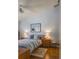 Relaxing bedroom with a vaulted ceiling, soft blue walls, and a cozy, inviting atmosphere at 39650 Us Hwy 19 N, Tarpon Springs, FL 34689