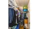 Organized walk-in closet with ample storage for clothing, shoes, and accessories at 39650 Us Hwy 19 N, Tarpon Springs, FL 34689
