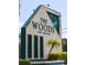 Neighborhood sign that reads: The Woods Deed Restricted at 39650 Us Hwy 19 N, Tarpon Springs, FL 34689