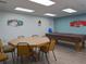 Resident game room with tables and equipment for residents at 39650 Us Hwy 19 N, Tarpon Springs, FL 34689