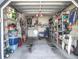 Spacious garage with ample storage, washer and dryer, and well-lit interior at 39650 Us Hwy 19 N, Tarpon Springs, FL 34689