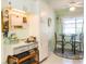 Bright kitchen nook with built-in desk and cabinetry, perfect for coffee and small meals at 39650 Us Hwy 19 N, Tarpon Springs, FL 34689