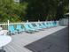 Resident pool deck with plenty of lounge chairs and shade at 39650 Us Hwy 19 N, Tarpon Springs, FL 34689
