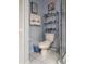 Toilet area featuring adjacent cabinet and shower stall at 39650 Us Hwy 19 N, Tarpon Springs, FL 34689