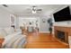 Spacious living room boasting wood floors, fireplace, and ample space for entertaining at 400 E Jean St, Tampa, FL 33604