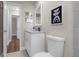 Bathroom featuring tile floors, modern vanity, and new fixtures at 4418 Pine Meadow Ct, Tampa, FL 33624