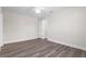 A spacious bedroom with neutral walls and flooring is shown in this real estate photograph at 4418 Pine Meadow Ct, Tampa, FL 33624
