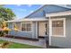 Charming single story home with a well-manicured lawn and inviting front door at 4418 Pine Meadow Ct, Tampa, FL 33624