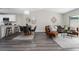 Bright, open floor plan seamlessly blends living, dining, and kitchen, perfect for modern living at 4418 Pine Meadow Ct, Tampa, FL 33624