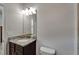 Bathroom featuring a granite vanity and a toilet at 449 Bahama Grande Blvd, Apollo Beach, FL 33572
