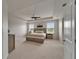 Spacious main bedroom with tray ceilings and neutral decor at 449 Bahama Grande Blvd, Apollo Beach, FL 33572
